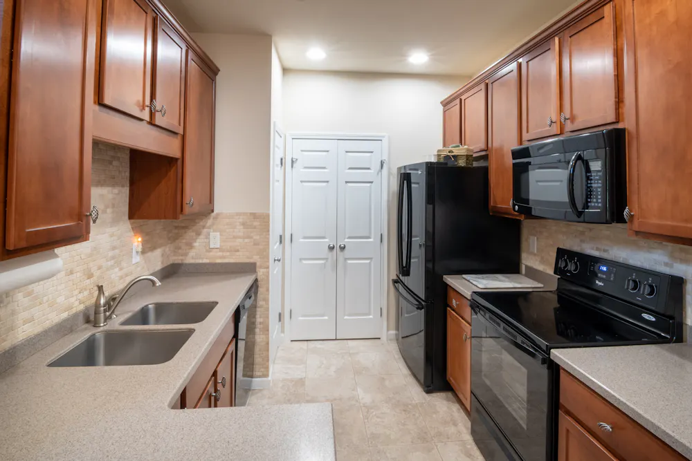Cuisine équipée en chêne de 14 m² réalisée à Treillières